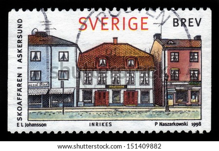 SWEDEN - CIRCA 1998: A stamp printed in Sweden, shows shoestore in small town Askersund on a lake VÃ?Â¤ttern, circa 1998