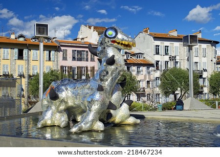 NICE, FRANCE - March 23 : Modern sculpture Loch Ness Monster ( Monstre du Loch Ness ) by Niki de Saint Phalle, french sculptor near the Contemporary Art Museum in Nice, France on March 23, 2014