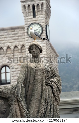 Monte Carlo, French Riviera - March 21: statue to honor Prince Albert, Prince\'s Palace of Monaco, official residence of Prince Monaco, Genoese fortress on March 21, 2014, Monte Carlo, French Riviera
