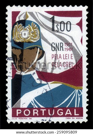PORTUGAL - CIRCA 1962: A stamp printed in Portugal shows soldier of Republican National Guard, 50th anniversary, circa 1962