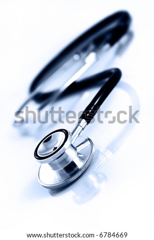Stethoscope with reflection and blue tint selective focus Stethoscope with reflection and blue tint selective focus