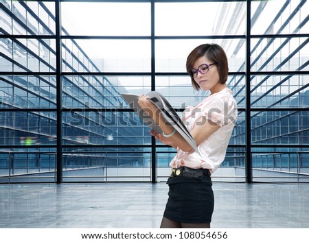 Business woman indoor, closeup portrait of Asian inside building of office