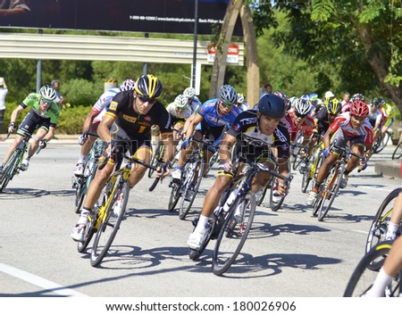PAHANG, MALAYSIA - MARCH 5:Unidentified rider speeding for podium following the 7th stage of the Le Tour De Langkawi 2014 cycling race between Kota Tinggi and Pekan, Pahang, on March 5.
