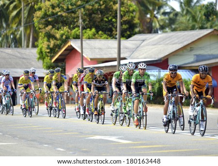 PAHANG, MALAYSIA - MARCH 6:Unidentified rider racing for podium following the 8th stage of the Le Tour De Langkawi 2014 cycling race from Kuantan, Pahang, on March 6.