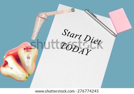 Concept image of a check list Diet. The empty  words start diet today written on a white notebook to remind you an important appointment.