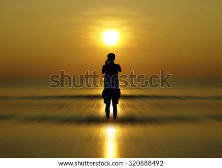 Silhouette of Man watching when sun rising up