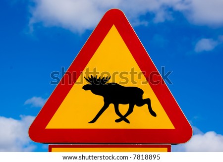 triangular traffic warning sign warning for moose