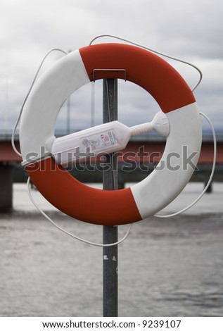 life saver buoy attached to a metal pole