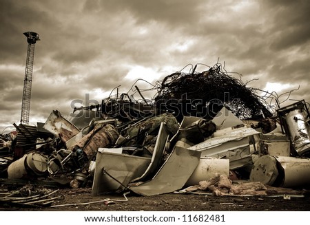 a large pile of metal chinks on a junkyard