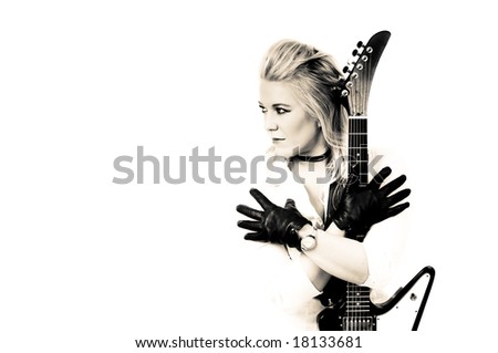 stock photo : rocker girl posing with a heavy metal guitar