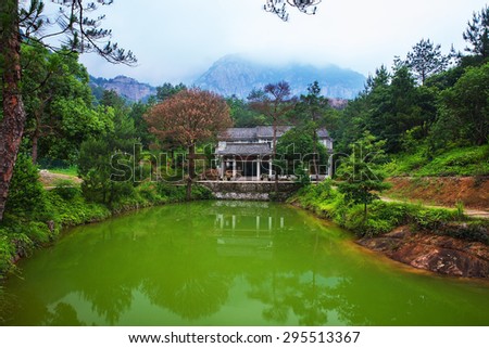 Chinese lake with temple and mountain scenery. Wenzhou Yandang mountain in China
