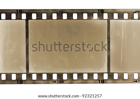 old scratched frame of 35 mm film, isolated on white