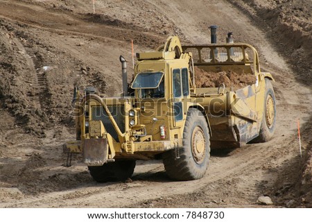 Earth-mover with load