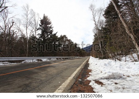 road surrounded by snow-covered in Japan
