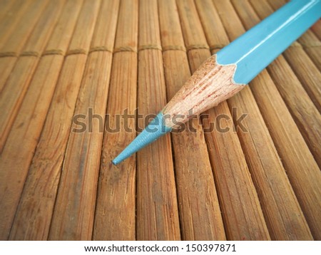 Color Pencil on bamboo pad background