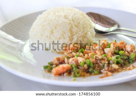 Basil Fried Rice with Pork.Basil fried rice with pork in white dish