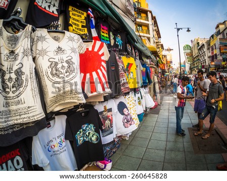 BANGKOK - MAR 8: An unidentified street vendor prepares sell Clothing to foreign traveler on Khao San Road on Mar 8, 2015 in Bangkok, Thailand.