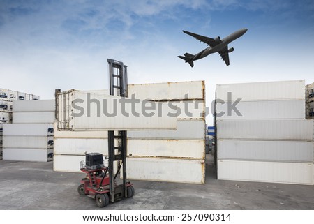 forklift handling the container box in logistic zone