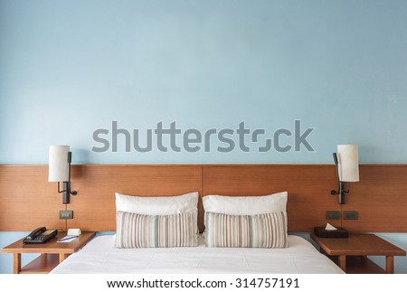 Beautiful and modern bedroom with empty wall for add some text, logo, image, etc.