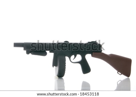 stock photo A toy Tommy gun isolated on white