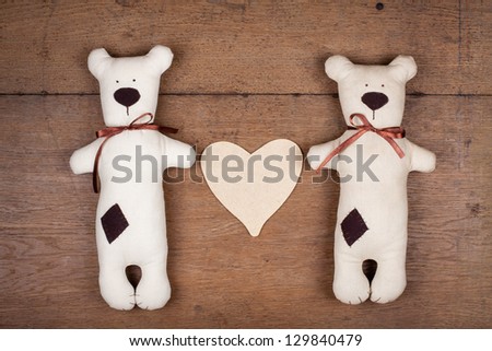 Valentine heart with handmade bears pair and on wood
