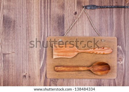 Wooden signboard hanging wall background, spoon, spatula