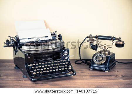 Vintage Telephone, Old Typewriter On Table