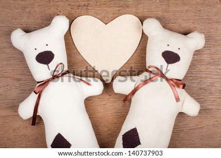 Valentine heart with handmade bears pair and on wood