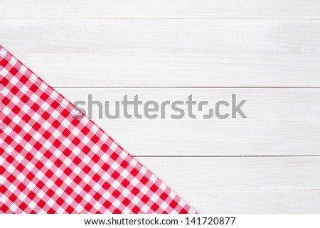 White And Red Tablecloth Textile Texture On Wooden Table Background