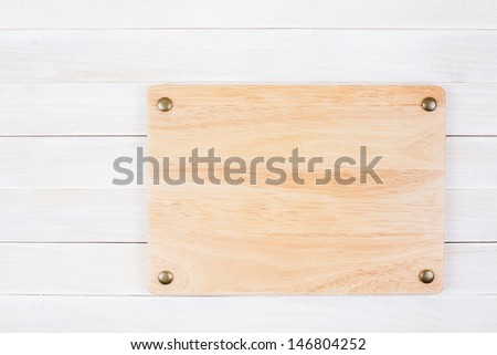 Signboard on white wood wall background