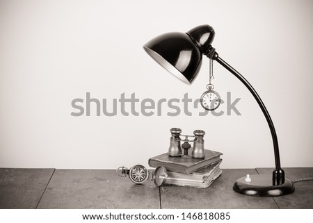 Retro table lamp, compass, binoculars, pocket watches, books