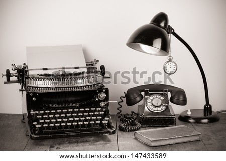 Vintage Typewriter, Old Rotary Telephone, Lamp, Book, Pocket Watch On Table Still Life