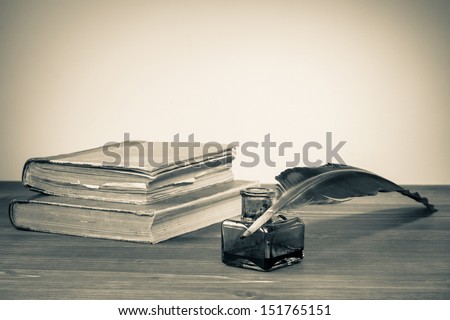 Quill Pen, Ink Bottle, Old Books On Table For Vintage Background
