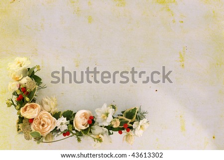 multi flower arrangement on a cream textured background