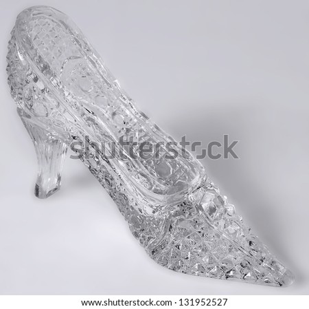 One crystal shoe of the Cinderella on a white background