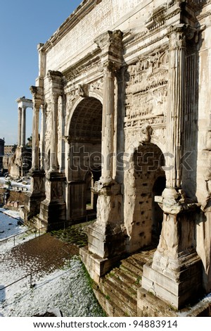 The white marble Arch of Septimius Severus at the northwest end of the Roman Forum is a triumphal arch dedicated in AD 203 to commemorate the Parthian victories of Emperor Septimius Severus.