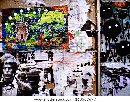 PARIS, FRANCE - AUGUST 24: The detail of an old billboard place on August 24, 2006 in Mortmartre, Paris.