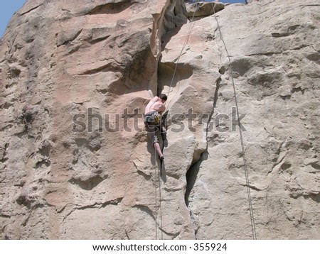 Rock Climbing a 5-10a route in Billings, Montana