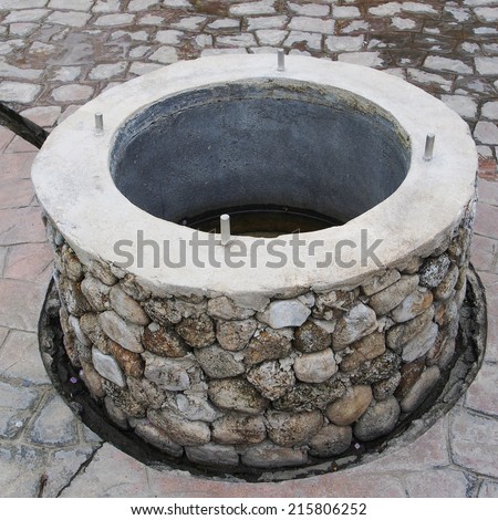 A stone water well