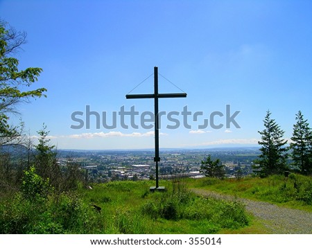 This is a 100 foot tall Cross, a memorial to a man's son who passed away 40 years ago. Located atop Burlington Hill, Burlington, Washington state, USA