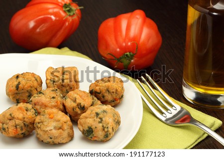 Chicken meatballs with beefsteak tomatoes