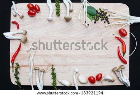 Modern minimalism still life with mushrooms and chili on a wooden background. Food backround