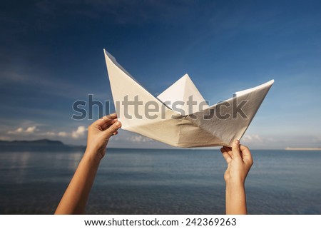 Paper boat, travel concept