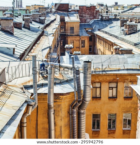 Roof top view European part of of St. Petersburg city Russia. Chimneys and roofs skyline