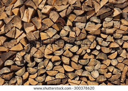 Chopped Firewood in Village. Background