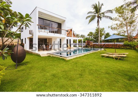 Luxury villa with swimming pool outside exterior view