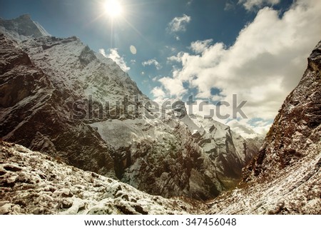 Mountain Landscape with Sun and Snow in Himalayas