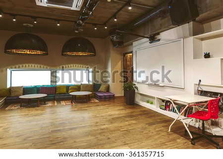 Loft cafe interior, meeting room with desk, comfortable seat place