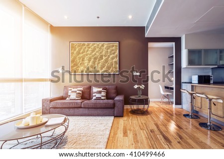 living room with big window interior. Big picture on brown wall