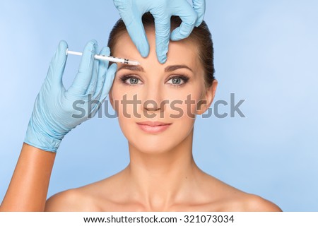 Beauty woman giving medical injections.